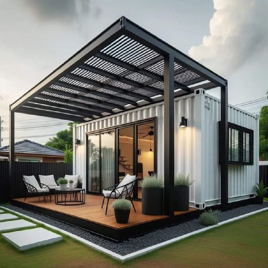 The meme is a photo of a small, modern house made from a shipping container, with a sleek and minimalist design. The text "I just got a new house and I'm so excited to finally have a place to store all my stuff" is written in a childlike, scribbled font on a whiteboard on the wall. The image is a humorous commentary on the idea of a "new house" being a shipping container, implying that the person is not actually moving into a traditional home.